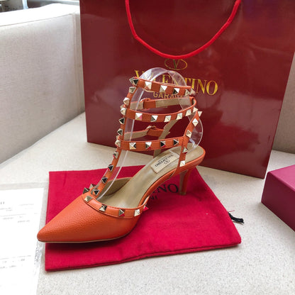 ROCKSTUD FIRE ORANGE METALLIC CALFSKIN ANKLE STRAP HIGH SANDAL
