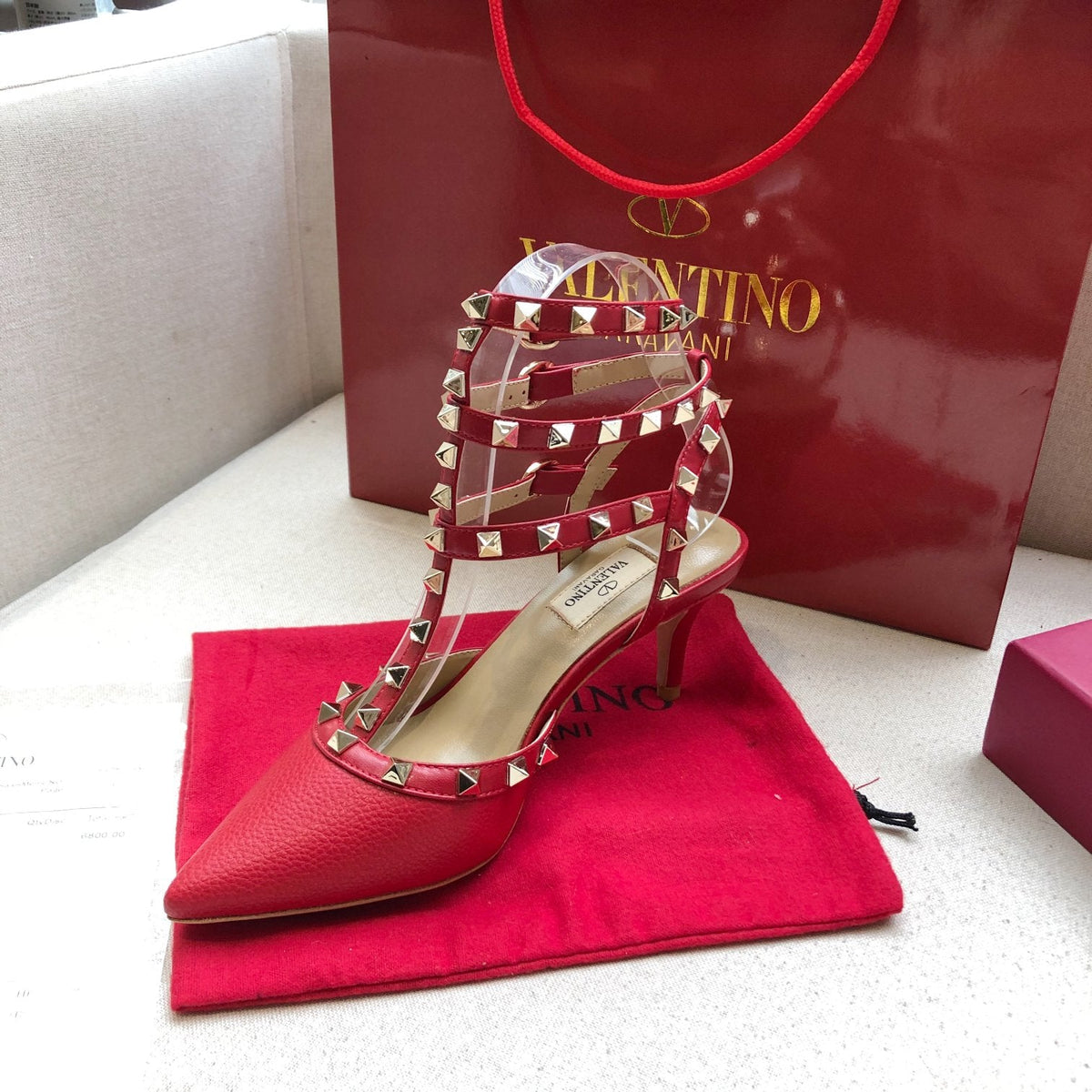 ROCKSTUD RUBY RED METALLIC CALFSKIN ANKLE STRAP HIGH SANDAL